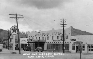 J16/ San Luis Colorado RPPC Postcard c1950s Don Carlos Hotel Gas Station 278