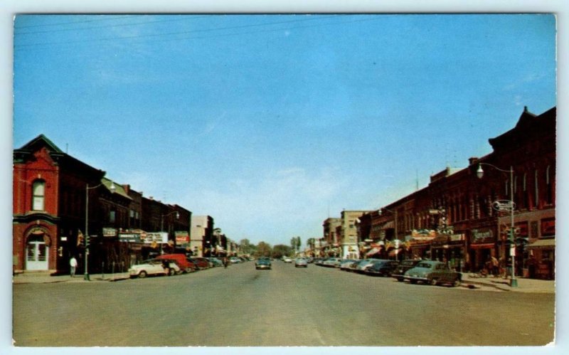 STORM LAKE, Iowa IA  looking North on MAIN STREET Scene 1950s Cars   Postcard