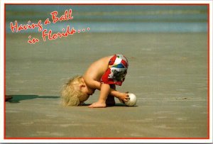 Florida Young boy On Beach Having A Ball