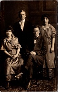 Real Photo Studio Postcard Portrait of Men and Women Family