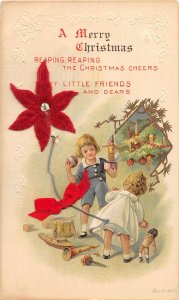 H42/ Merry Christmas Holiday Postcard c1910 Novelty Felt Flower Bow Kids 18