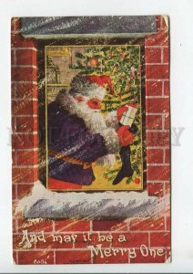 444062 Xmas stocking SANTA CLAUS New Year Gift USA Vintage postcard EMBOSSED