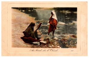 Algerian Women washing clothes in River