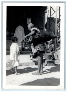 1939 Peddler Giving Water To Little Girl Casablanca Morocco RPPC Photo Postcard