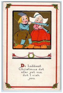 c1910's Christmas Dutch Boy Girl Flute Embossed Hagerstown Maryland MD Postcard 