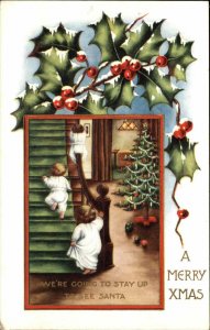 Christmas Children Playing Stairs Embossed Vintage Postcard