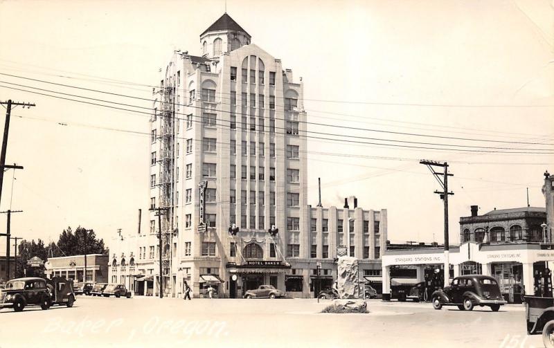 Baker Oregon~Hotel~Better Meals~Oldsmobile Dealer~Standard Station~1943 WW2 RPPC 