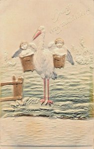 HEARTY CONGRATULATIONS-STORK DELIVERING BABY TWINS-EMBOSSED AIR BRUSHED POSTCARD