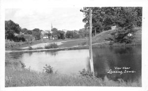 RPPC VIEW NEAR LANSING IOWA REAL PHOTO POSTCARD (c. 1940s)