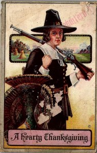 1912 HEARTY THANKSGIVING PILGRIM TURKEY MUZZLELOADER GUN POSTCARD 36-136