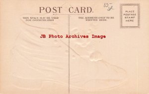 Beautiful Cat Climbing inside Old Brown Shoe