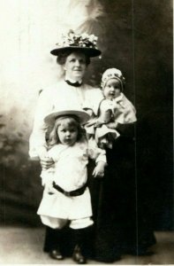 1909 Woman with Two Children Chicago Illinois IL Posted RPPC Photo Postcard 