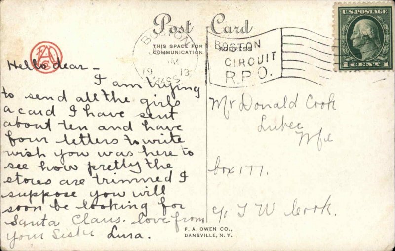 Little Boy Looks at Bobsled in Store Window Storefront c1910 Vintage Postcard 