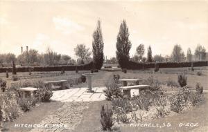 Mitchell South Dakota~Hitchcock Park Scene~Flower Gardens~Stone Benches~40s RPPC