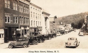 Sidney NY Main Street Hardware Store Old Cars Storefronts RPPC