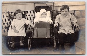 Waterloo~Mintie's (Lynch) Family~Toddlers Guard Infant Sibling in Carriage RPPC