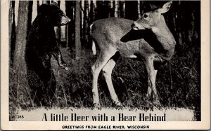 1930s EAGLE RIVER WISCONSIN LITTLE DEER WITH A BEAR BEHIND RPPC POSTCARD 38-58