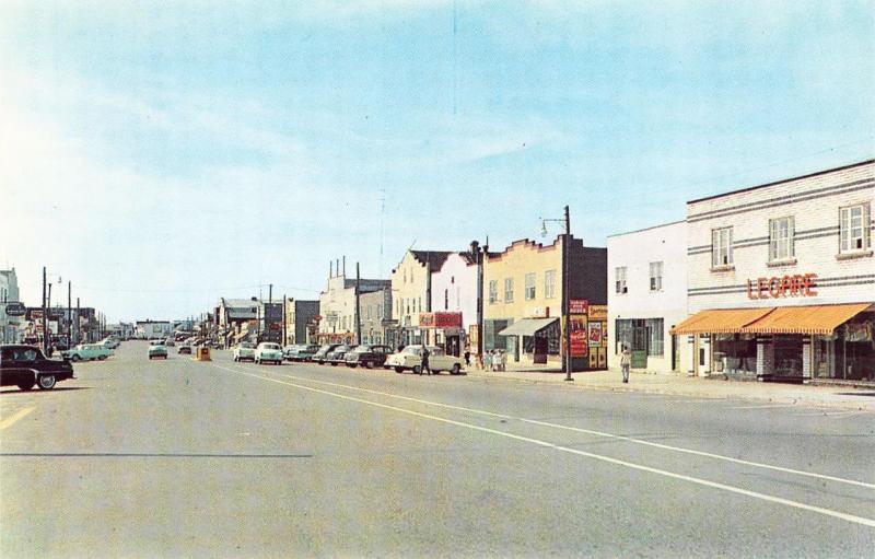 Malartic Quebec Canada Storefronts Business District Old Cars Postcard