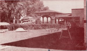 Cody Inn, Cody WY Entrance Lawn Vintage Postcard M63