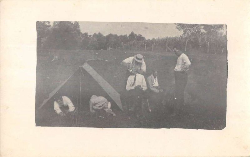 Gladbrook Iowa view of men by tent in field real photo pc ZC549266