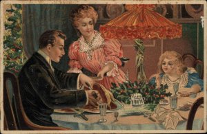 Christmas Daughter Watches Dad Carve Christmas Ham c1910 Postcard