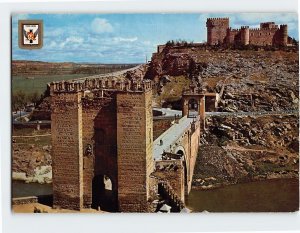 Postcard Alcántara bridge and San Servando Castle, Toledo, Spain