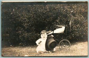 RPPC Adorable Baby Billy Playing With Hat and Pram Buggy UNP DB Postcard J5