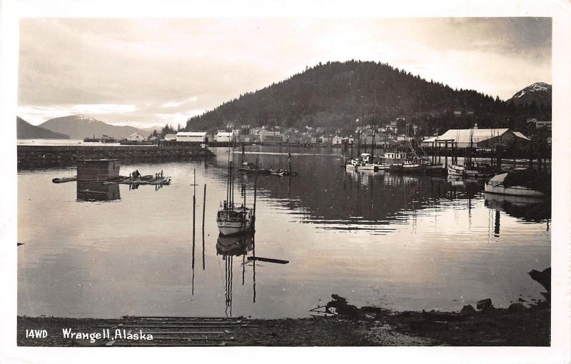 Wrangell Alaska~Harbor Scene~Fishing Boats @ Dock~Town on Hillside~c1950s RPPC