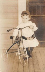 RPPC CHILD WITH TRICYCLE BIKE FORT WORTH TEXAS REAL PHOTO POSTCARD 1909