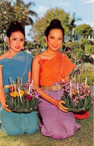 US84 Asia Thailand ladies ritual Loy krathong festival floating lighted flowers