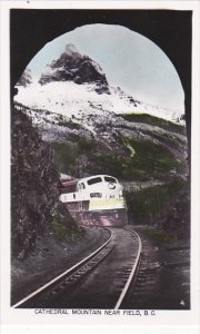 Canada Canadian Pacific Railroad Train Approaching Cathedral Mountain Near Fi...