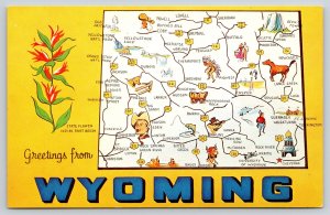 State Map~Greetings From Wyoming~Paint Brush Flower~Rawlins~Moran~1950s Postcard