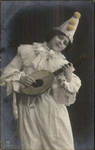 Beautiful Woman in Clown Outfit Playing Guitar Tinted Real Photo Postcard