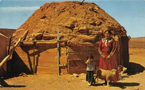 Navajo Indian Woman & Child Before A Typical Hogan 1960s Postcard