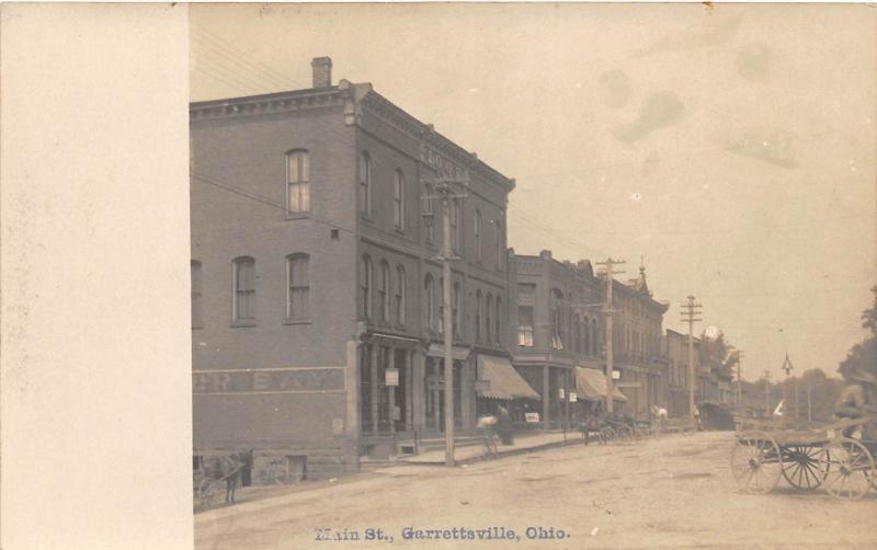 E71/ Garrettsville Ohio RPPC Postcard c1910 Main Street Stores I.O.O.F.