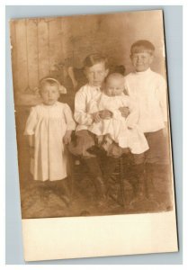 Vintage 1900's RPPC Postcard - Portrait Children and Baby in Living Room