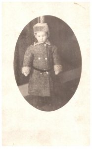 Boy in Winter Coat and Hat