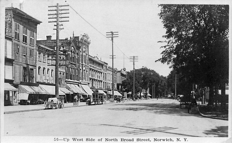 Norwich NY North Broad Street Storefronts Horse & Wagons Real Photo Postcard