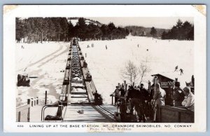 RPPC MT CRANMORE SKIMOBILES N CONWAY NEW HAMPSHIRE LINING UP AT THE BASE STATION