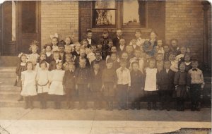 H82/ Interesting Teacher RPPC Postcard c1910 Early School Students 101