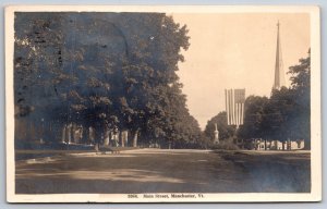 Manchester Vermont~US Flag Banner Over Main Street~Church~Monument~1912 RPPC
