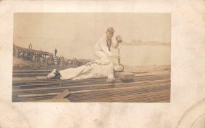 RPPC USS TENNESSEE MILITARY SHIP SAILOR'S ANVIL HAMMER REAL PHOTO POSTCARD 1915