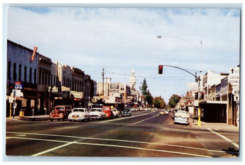 c1950 Street Road Classic Cars Stop Light Building Red Bluff California Postcard