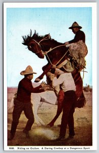 Western~Riding An Outlaw~Daring Cowboy On Bucking Horse~HH Tammen Vtg Postcard