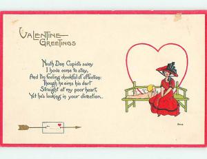 Unused Divided-Back valentine CUPID LOOKS UP AT GIRL ON BENCH r3956