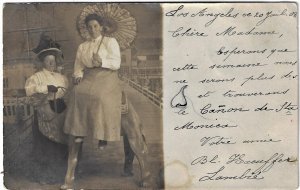 Ladies with Studio Prop Camel Parasol Los Angeles 1908 RPPC Real Photo Postcard