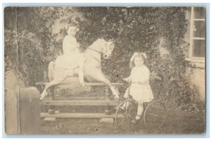 c1910's Cute Little Girls Rocking Horse Tricycle England UK RPPC Photo Postcard
