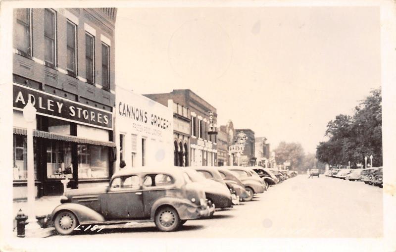 Sidney Iowa~Main Street~Cannons Grocery~Hotel~Drinking Fountain~1940s Cars~RPPC 