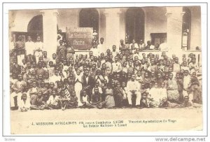 Crowd posing in front of La Saite Enfance a Lome, Togo, 00-10s