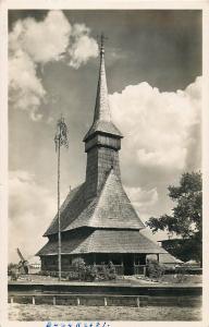 Romania Bucuresti Village Museum Bucharest wooden church wind mill in backround